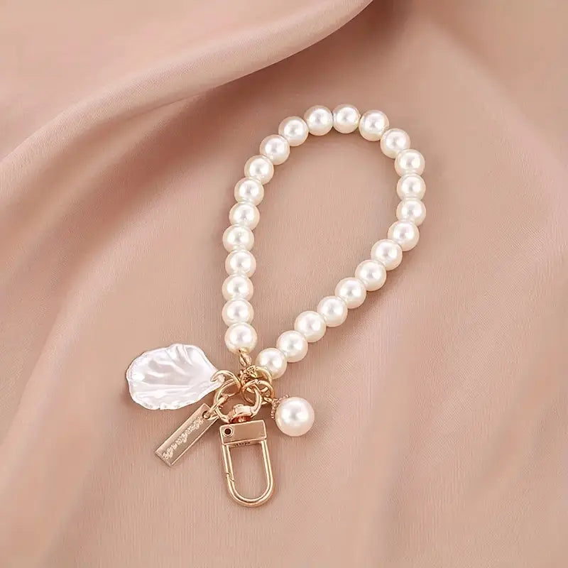 Elegant Faux Pearl Keychain With Heart Shell Charm.