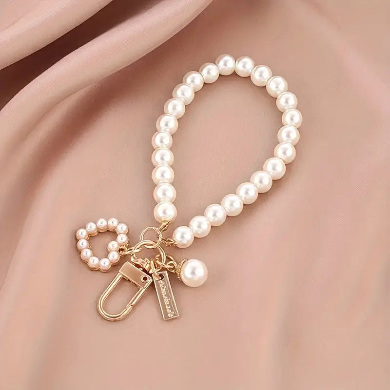 Elegant Faux Pearl Keychain With Heart Shell Charm.
