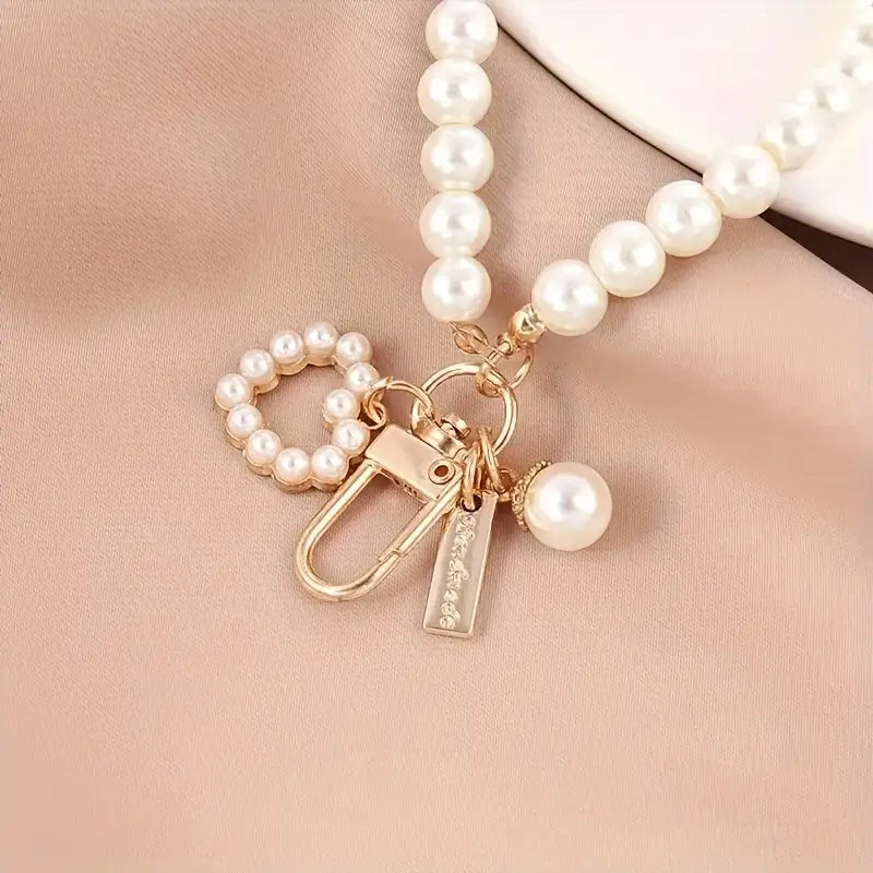Elegant Faux Pearl Keychain With Heart Shell Charm.