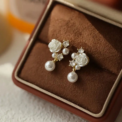 Elegant French-Inspired Camellia Flower Dangle Earrings with Sparkling Rhinestones.